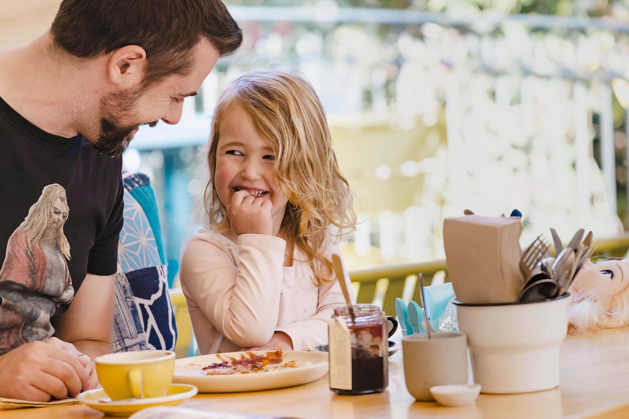 A father and Daughter laugh and enjoy their time at Proserpina